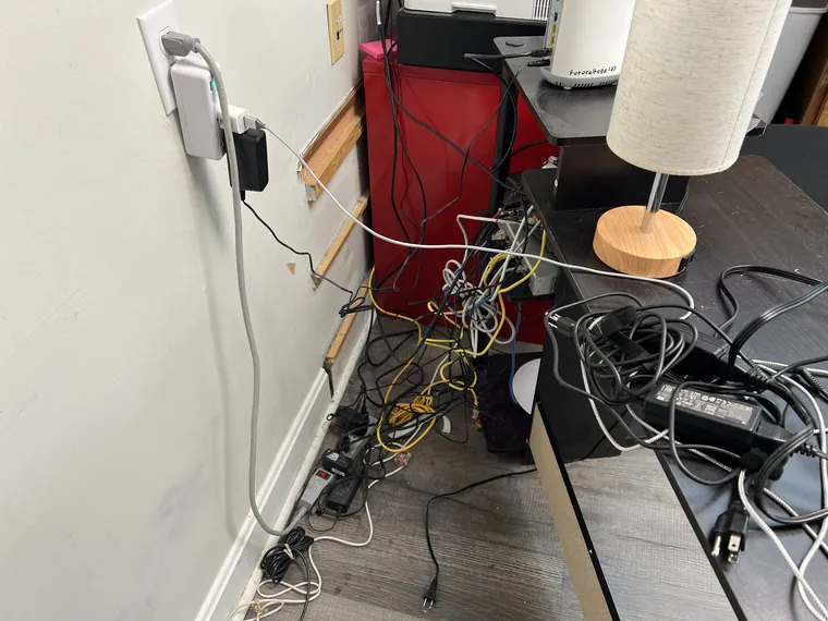 Loose power bricks and cords before cleanup