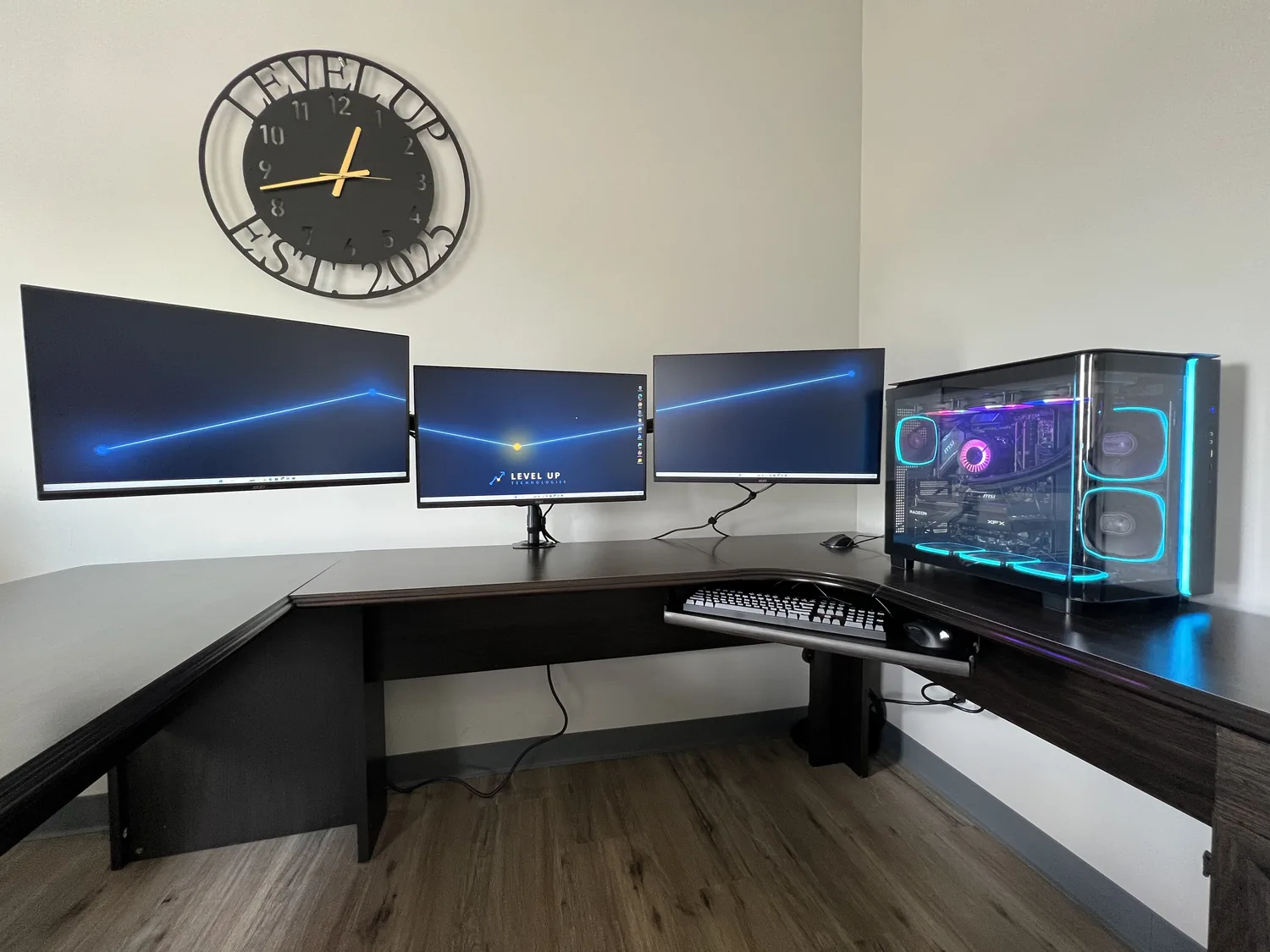Three-monitor workstation built by Level Up Technologies in Frankfort, KY